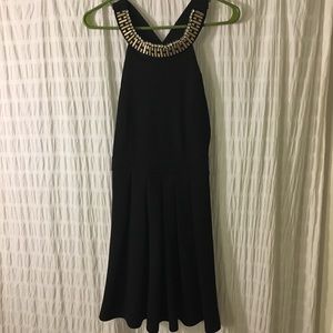 Black mini dress with beaded neckline